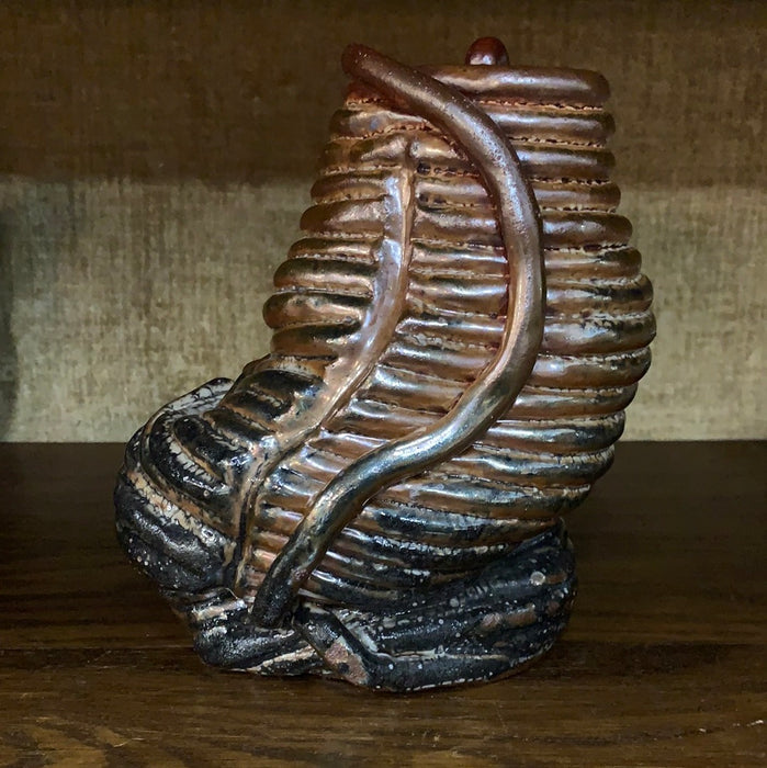 METALIC GLAZED POTTERY ODD SHAPED SCULPTURE