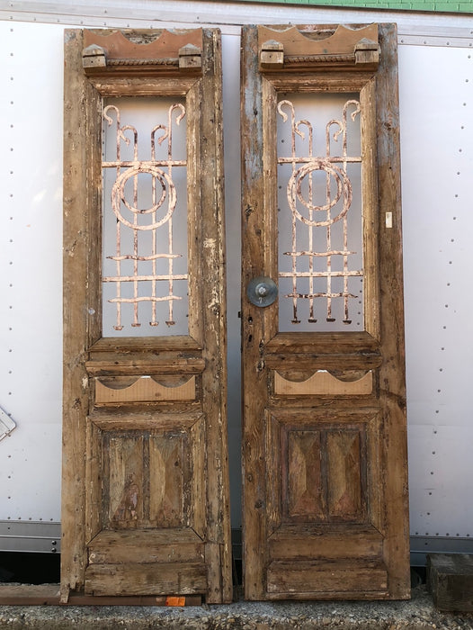 PAIR OF EGYPTIAN PRIMITIVE DOORS WITH IRON INSETS