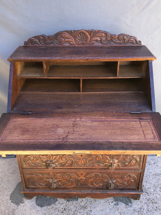 CARVED ENGLISH 1890S DROP FRONT OAK DESK