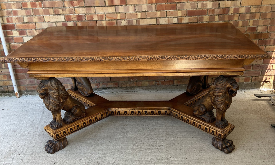 ITALIAN WALNUT DINING TABLE WITH CARVED LEGS