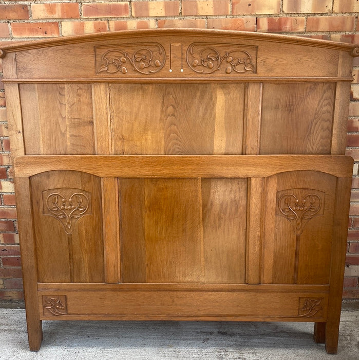 OAK BED WITH CARVED VINES