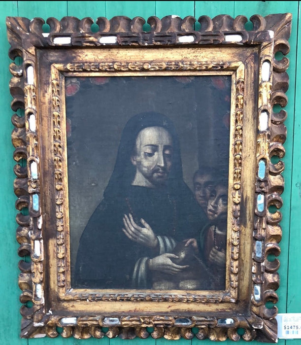 18TH CENTURY SAINT GIVING BREAD TO THE POOR OIL PAINTING ON CANVAS WITH GILT CARVED AND MIRRORED FRAME