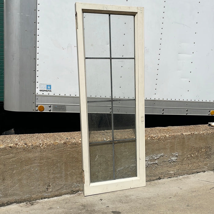 PAIR OF VERTICAL NARROW LEADED GLASS WINDOWS WITH RECTANGULAR PANES