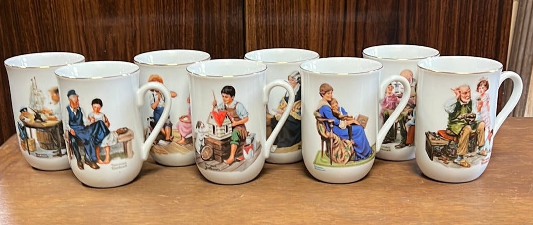 SET OF 8 NORMAN ROCKWELL MUGS