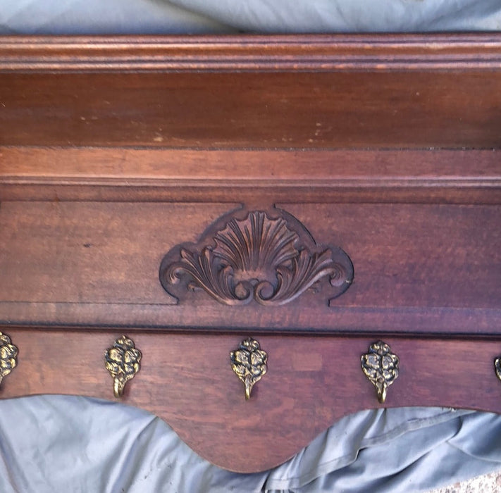 DARK OAK WALL SHELF WITH CENTER CARVED SHELL