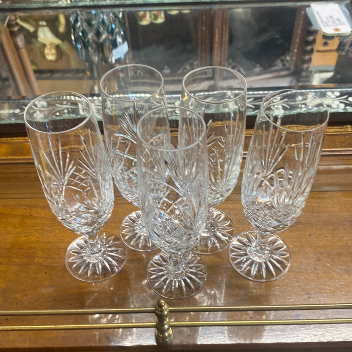 SET OF FIVE CRYSTAL STEMMED CHAMPAGNE FLUTES