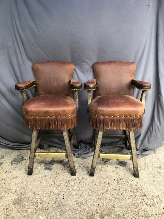 PAIR OF RUSTIC BARSTOOLS WITH LEATHER SWIVEL SEATS