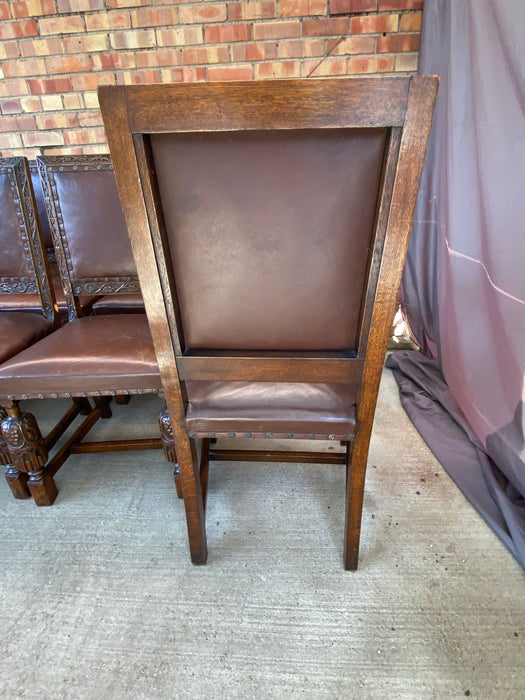 SET OF 8 OAK AND LEATHER TUDOR STYLE CHAIRS