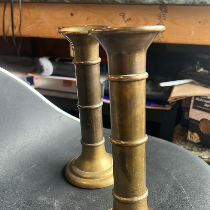 PAIR OF SMALL SUGMENTED BRASS CANDLESTICKS