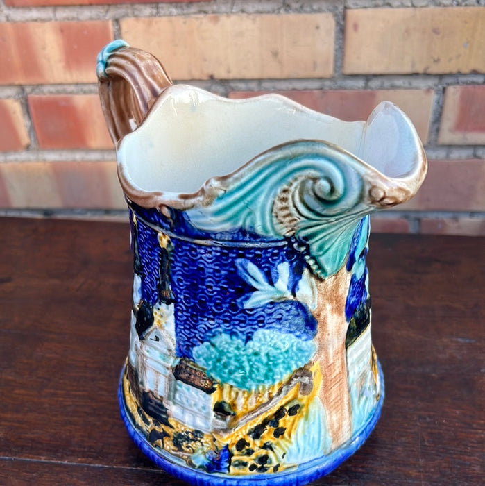 BLUE MAJOLICA PITCHER WITH CHURCH