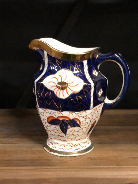 GAUDY WELCH ORANGE AND BLUE PITCHER