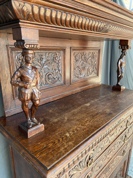 FRENCH FIGURAL CARVED DARK OAK SERVER CHEST WITH DOORS