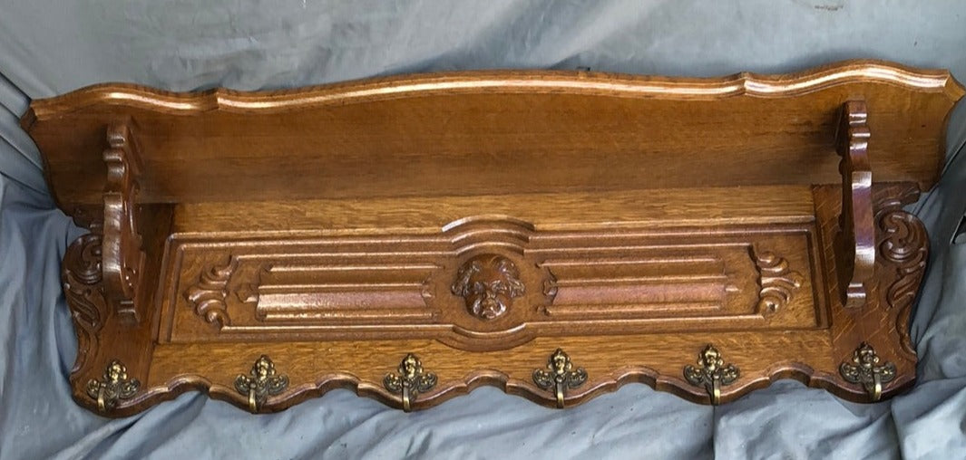 LARGE OAK WALL SHELF WITH CHERUB HEAD