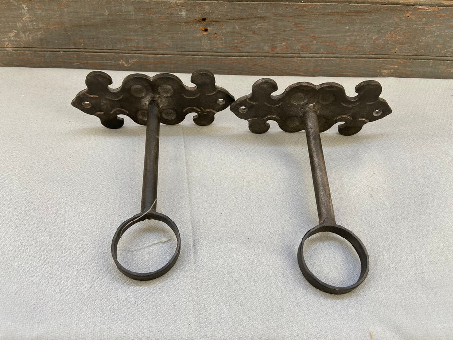 PAIR OF WROUGHT IRON CURTAIN HOLDERS