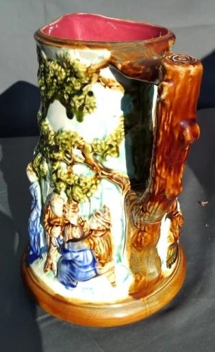 LARGE MAJOLICA PITCHER WITH PEOPLE