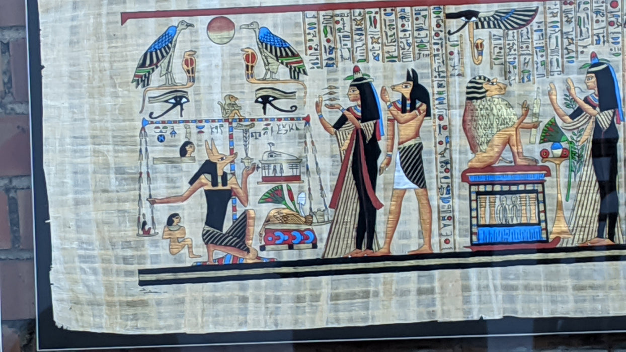 EGYPTIAN PRINT ON PAPYRUS FRAMED IN GLASS